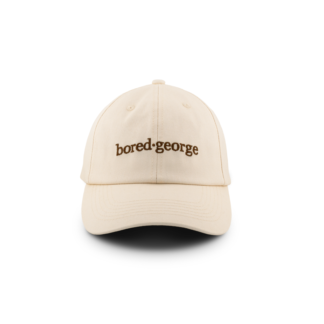 A beige baseball cap with the text 'bored.george' printed on the front.