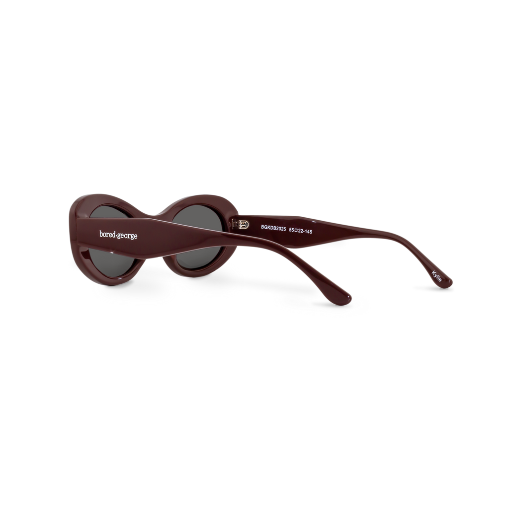 Left close-up of Bored George polarised merlot oval sunglasses for women – 90s inspired fashion eyewear